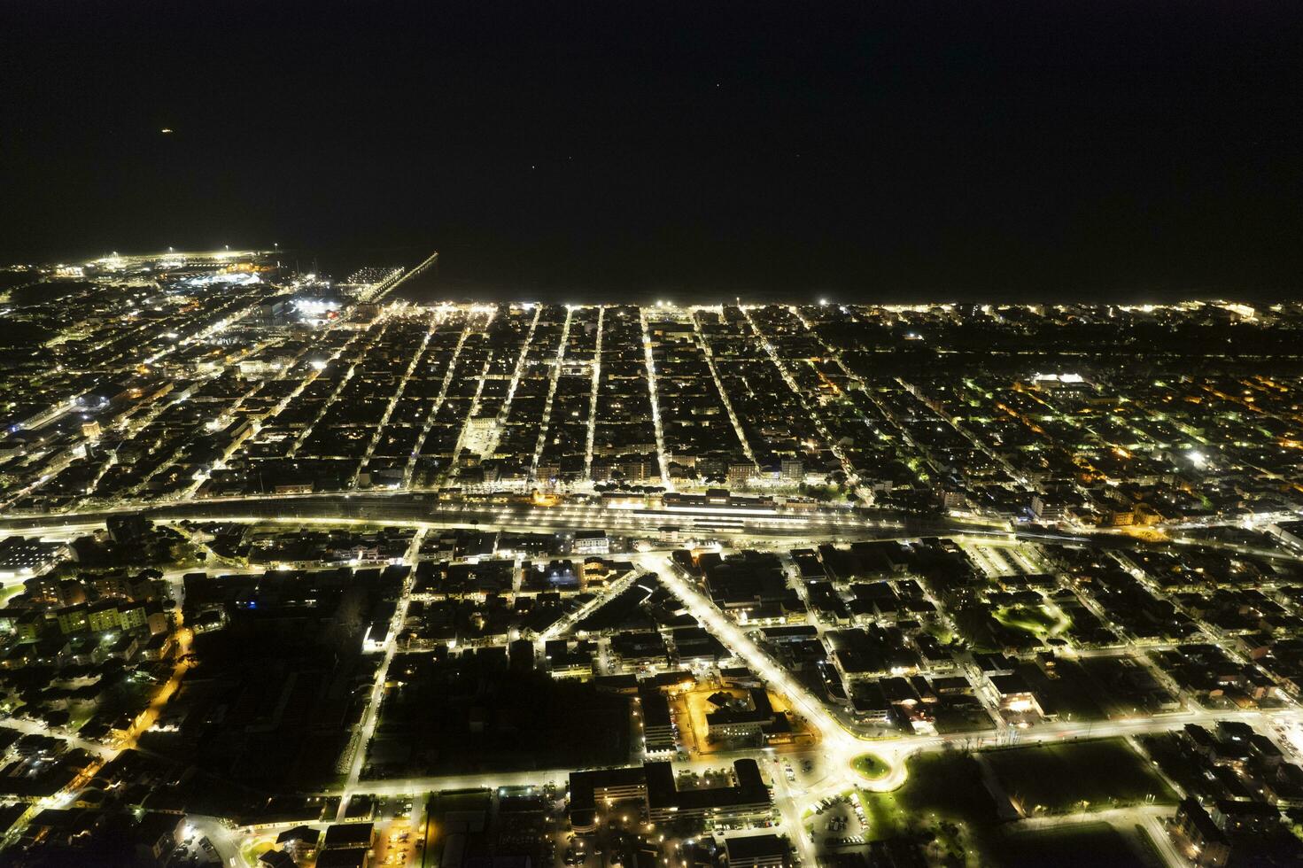 Night aerial view of the city of Viareggio Tuscany Italy photo