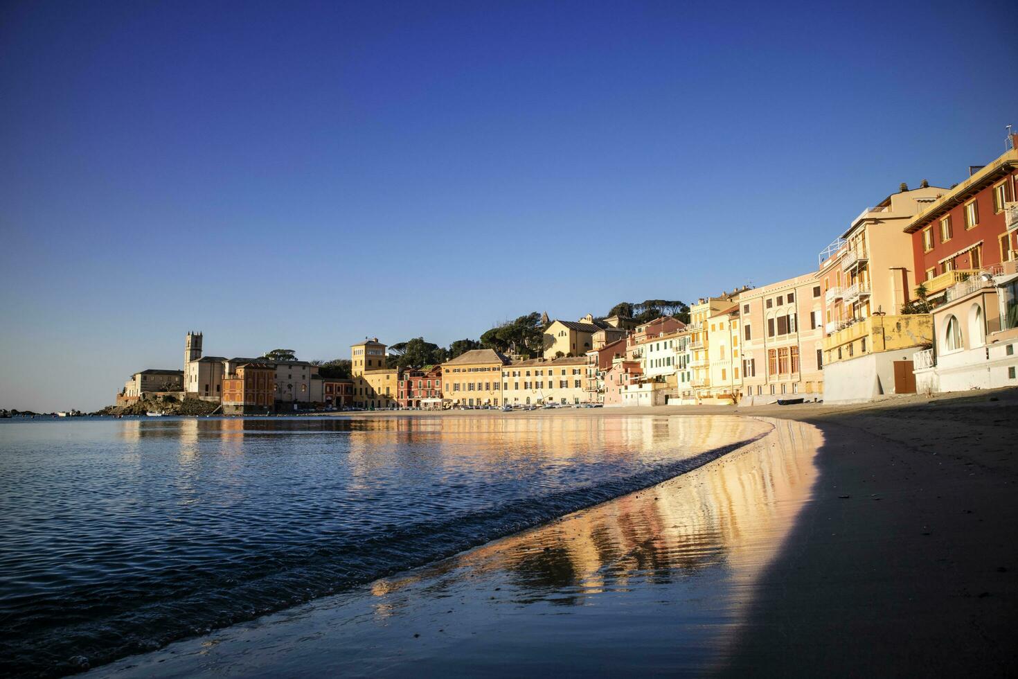 Sunrise view of the Bay of Silence in Sestri Levante Italy photo