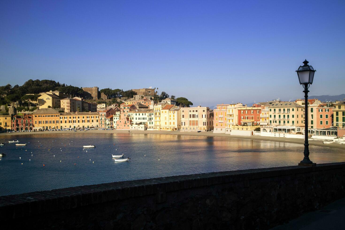 Sunrise view of the Bay of Silence in Sestri Levante Italy photo