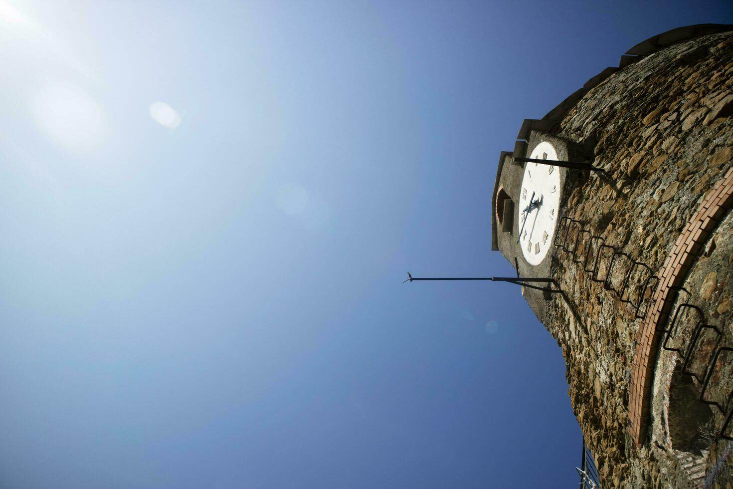 The clock tower in Riomaggiore Cinque Terre photo