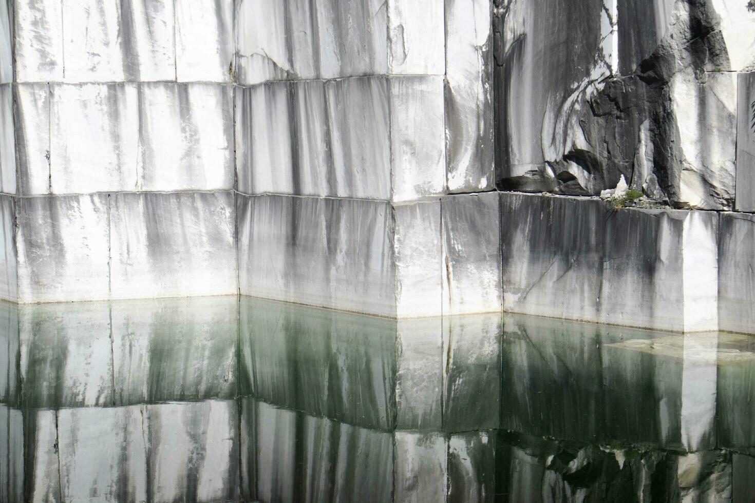 View of a wall after the extraction of the marble photo