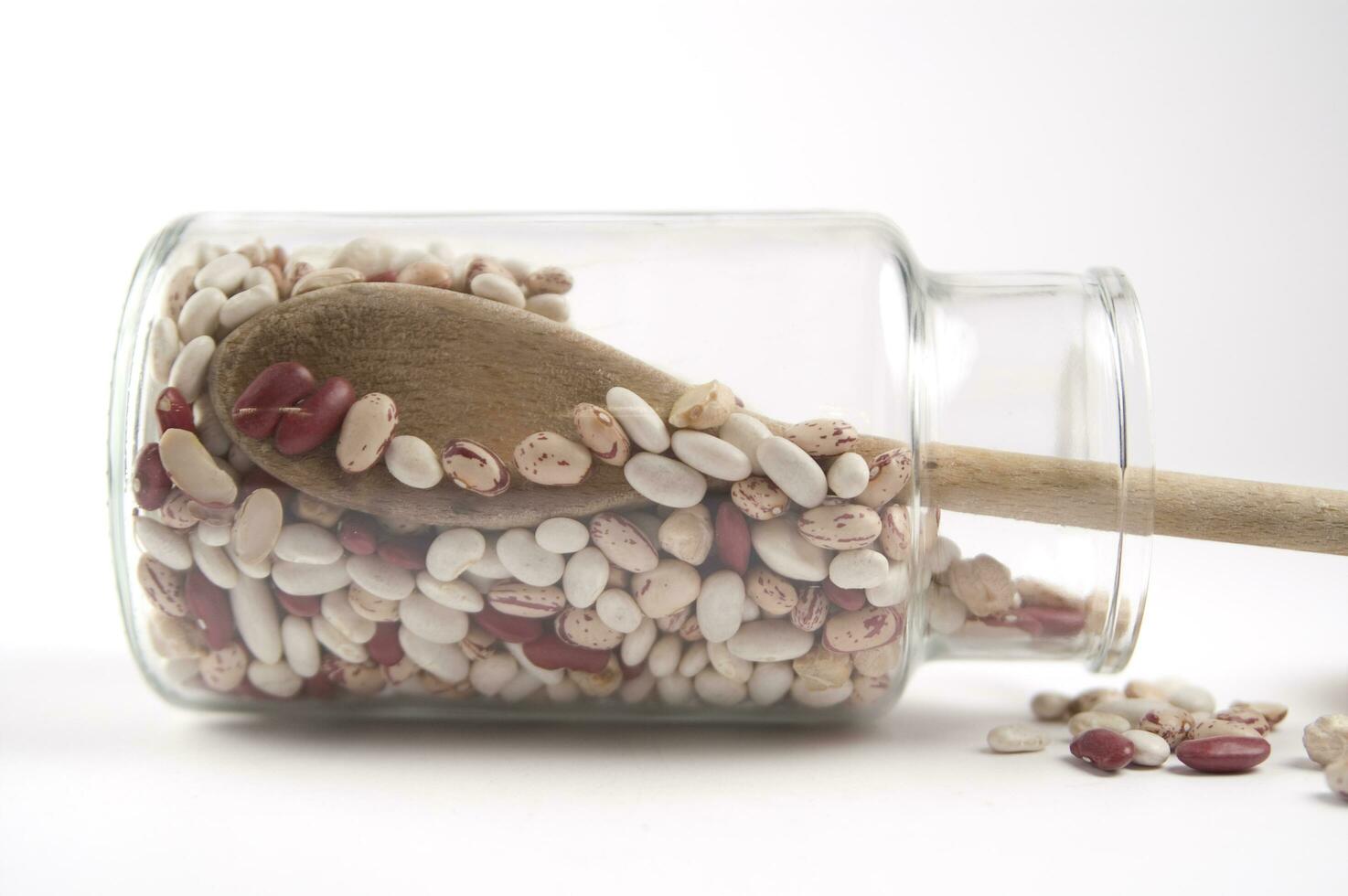 a jar of beans and a glass jar with beans 27092220 Stock Photo at Vecteezy