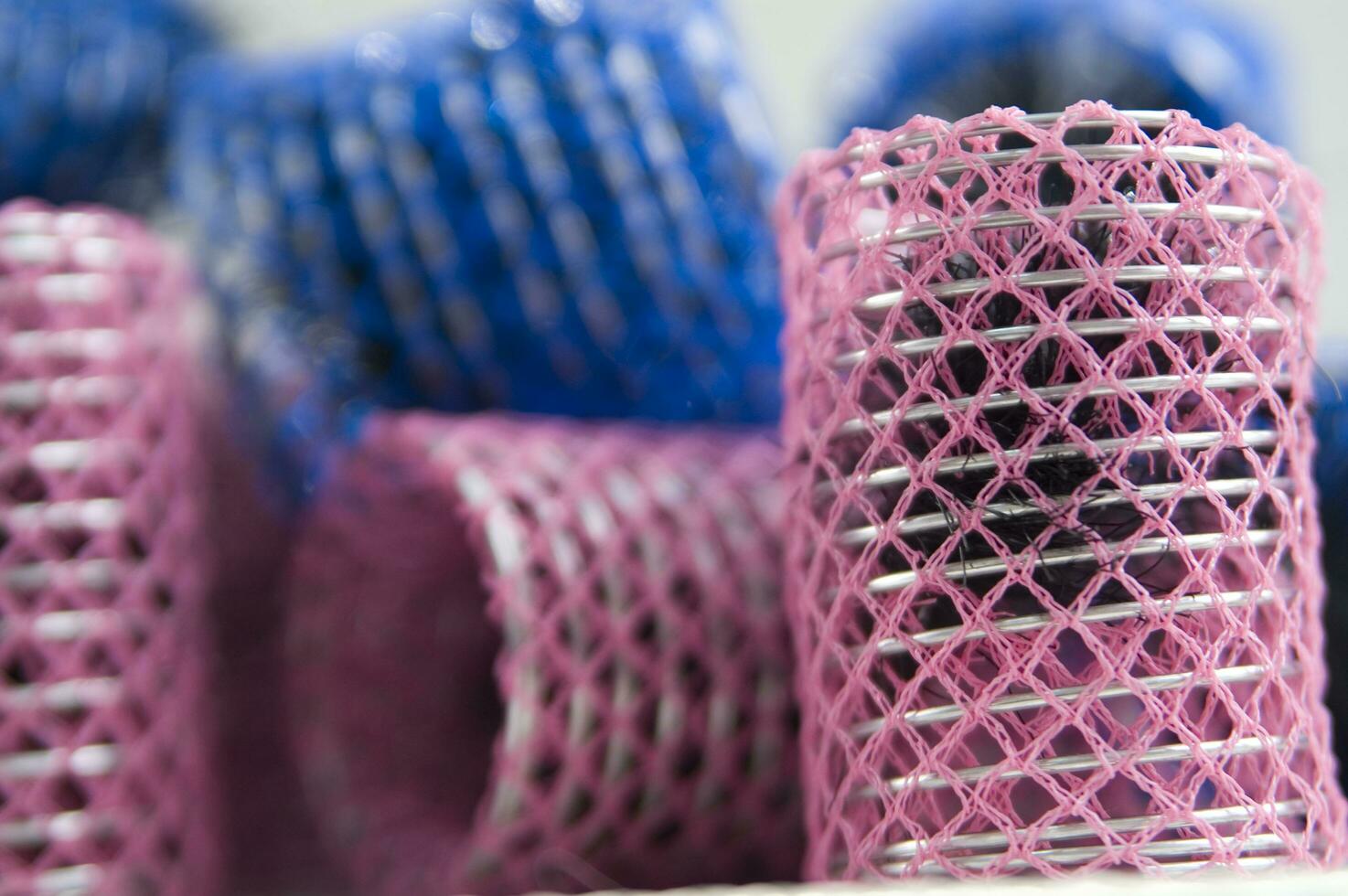 a pile of blue and pink mesh bags photo
