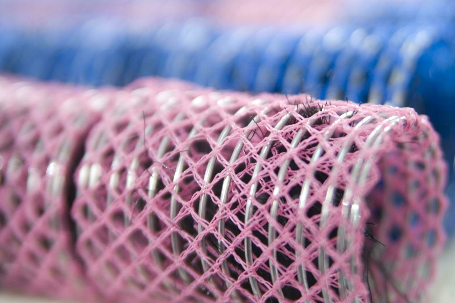 a pile of blue and pink mesh bags photo
