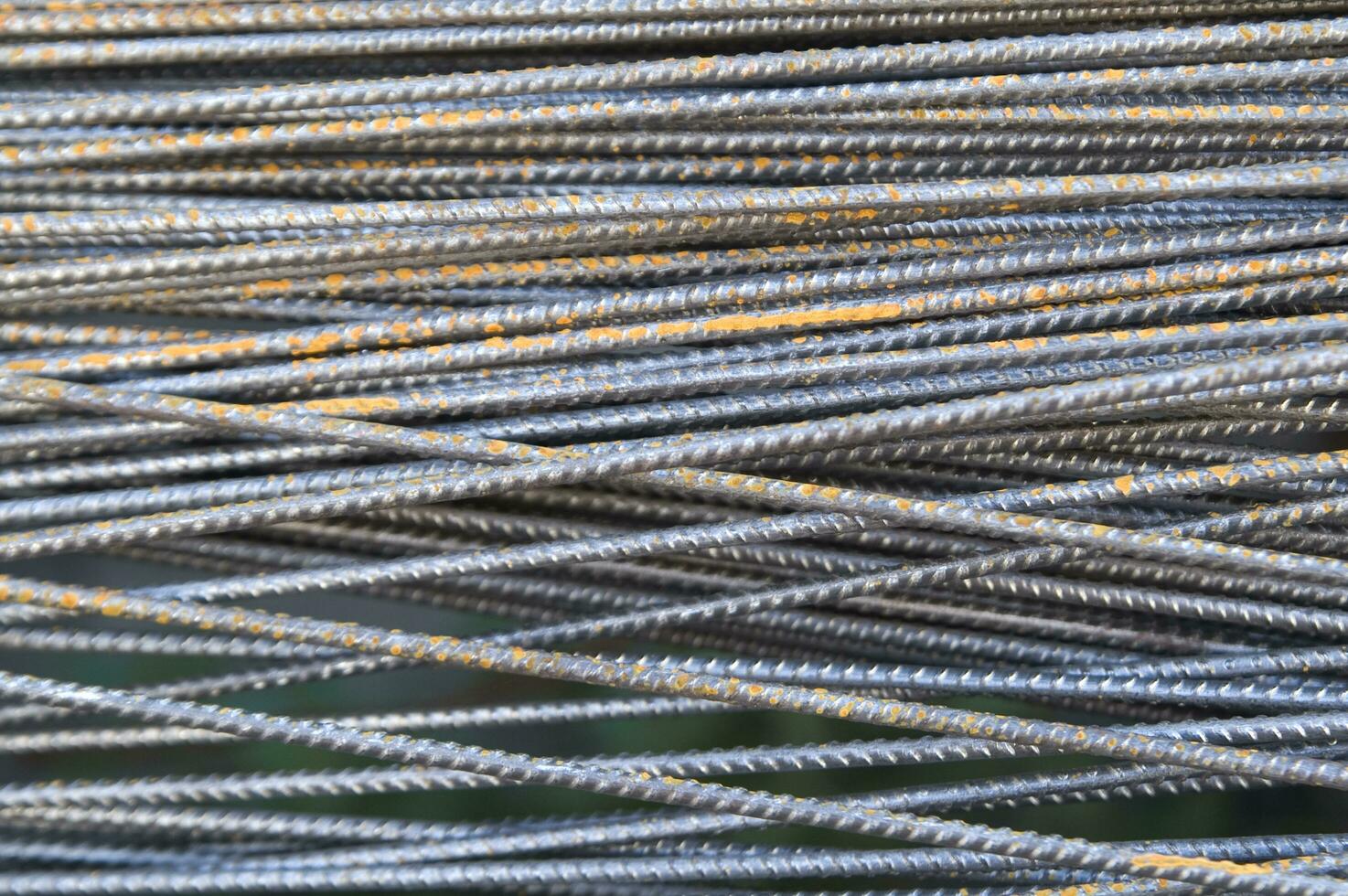 a pile of steel bars with rust on them photo