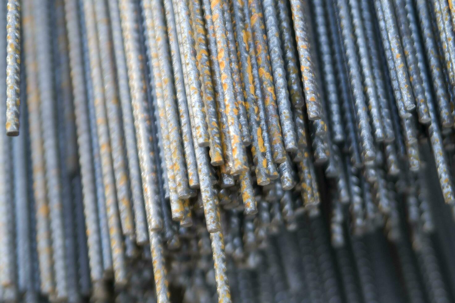 a pile of steel bars with rust on them photo