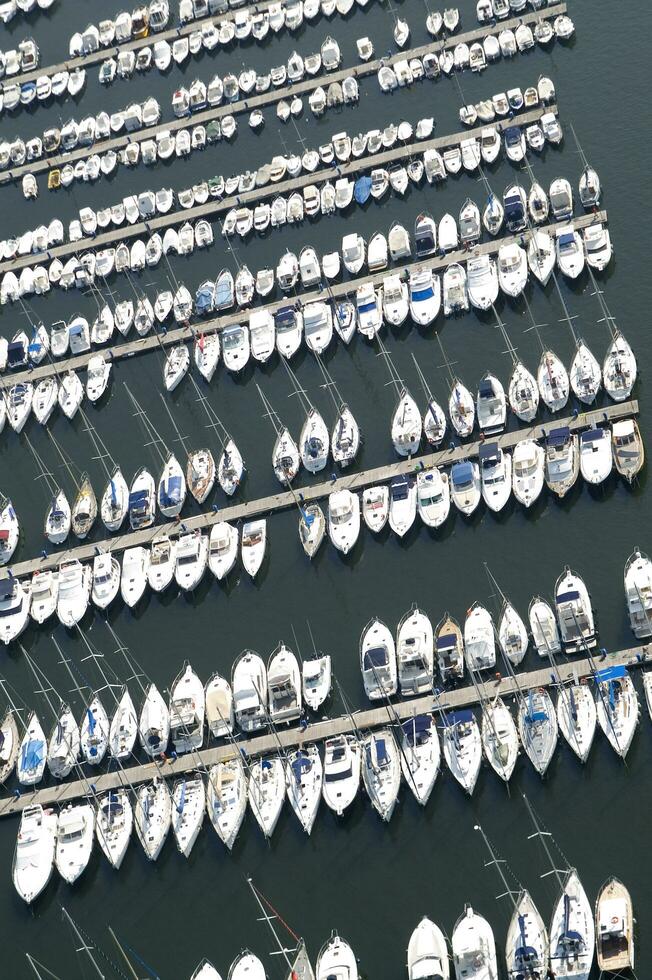 a large number of boats in a marina photo