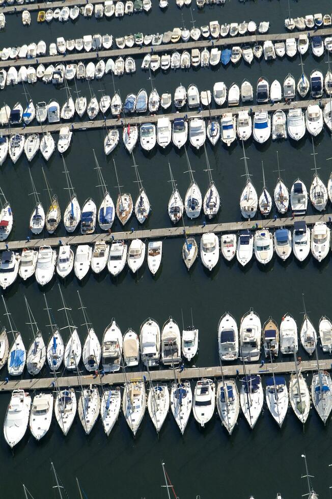 a large number of boats in a marina photo