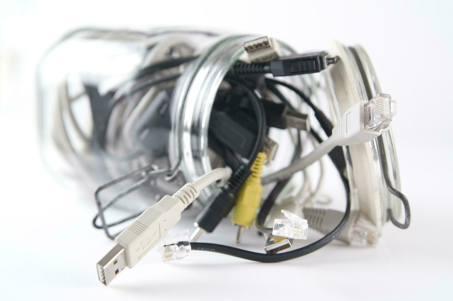 a glass jar filled with wires photo