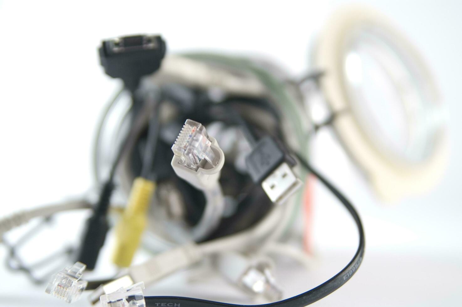 a glass jar filled with wires photo