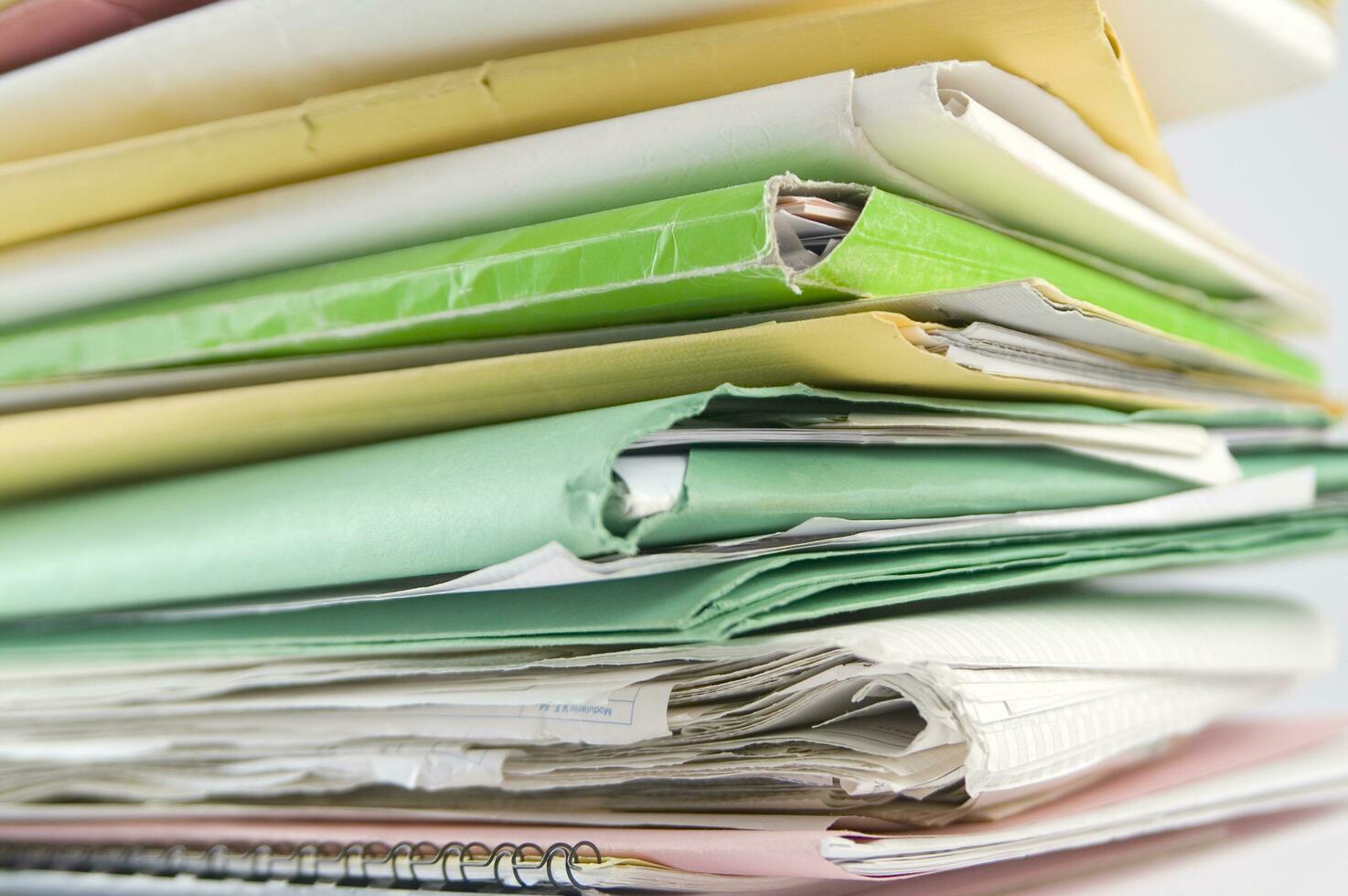 Stack of practices to be processed in the office photo