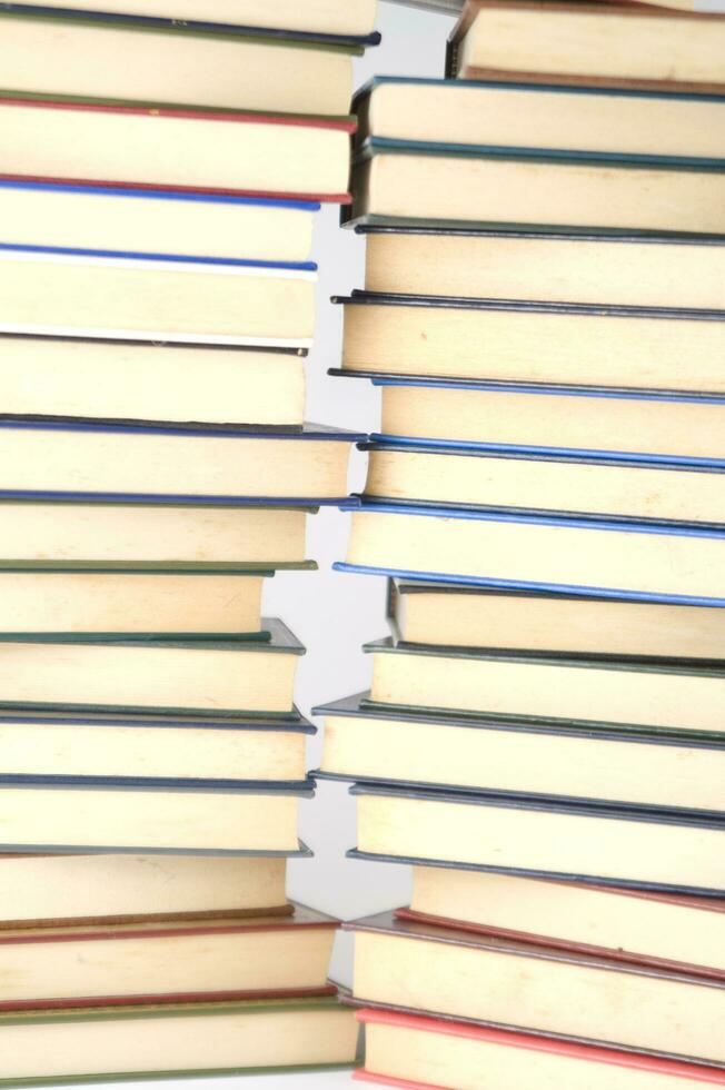a stack of books on a white background photo