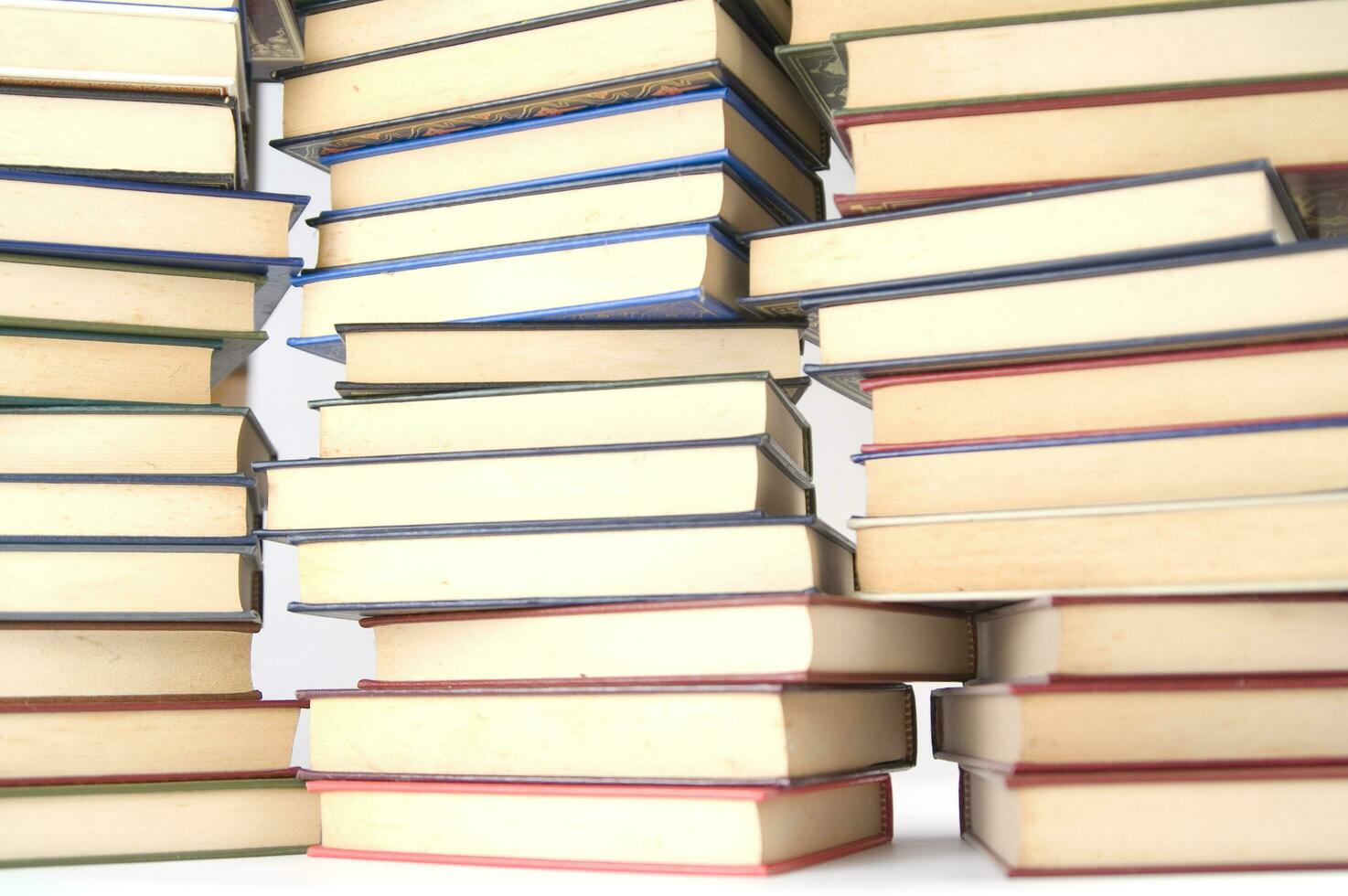 a stack of books on a white background photo