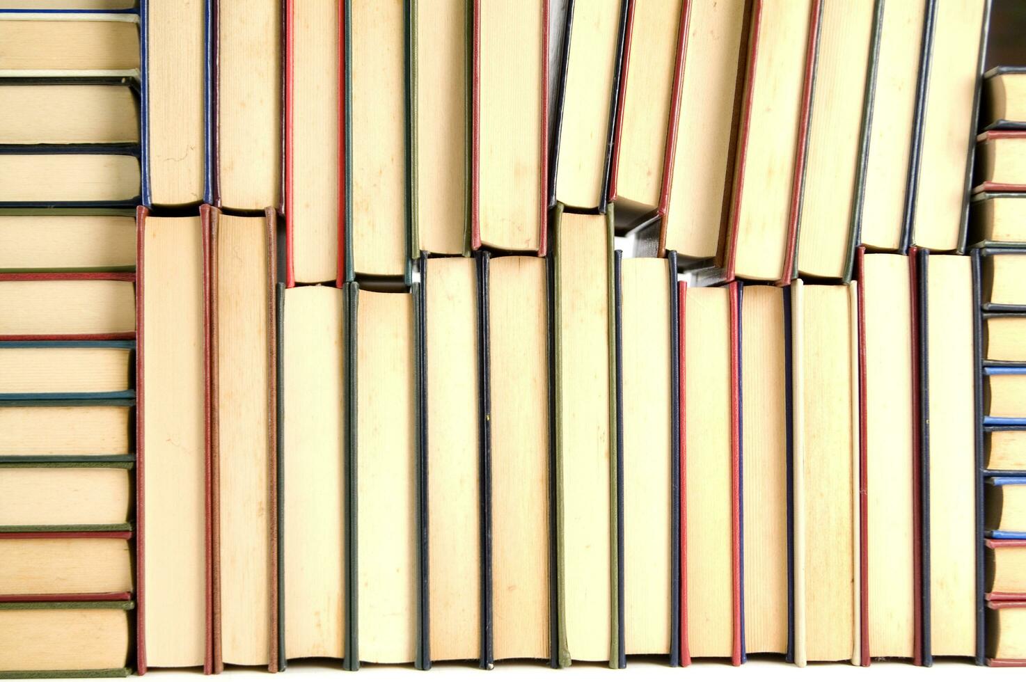 a stack of books on a white background photo