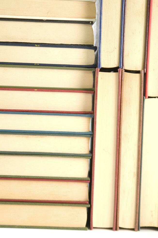 a stack of books on a white background photo