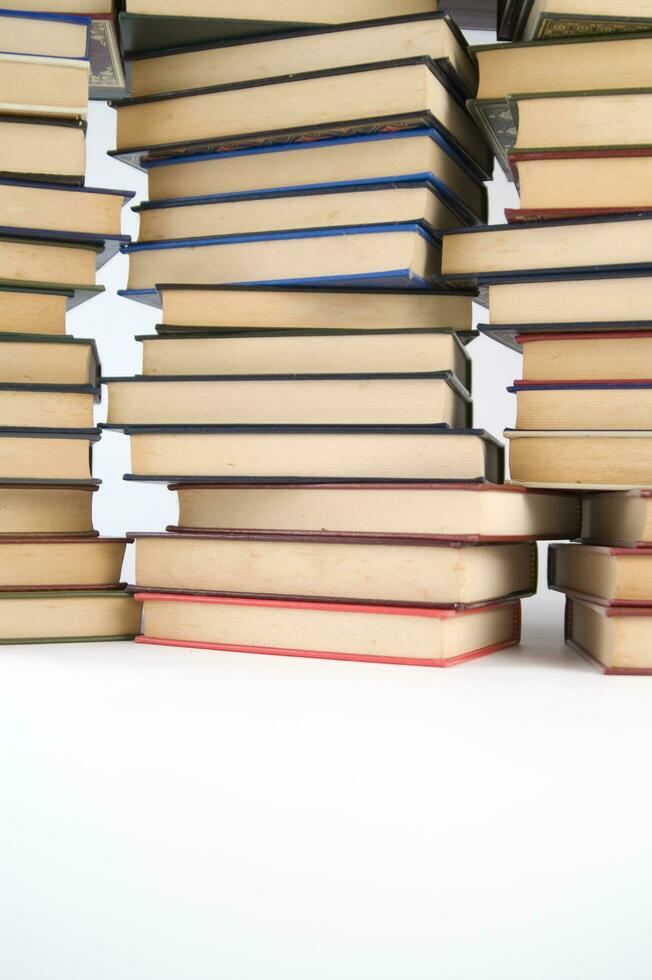 a stack of books on a white background photo