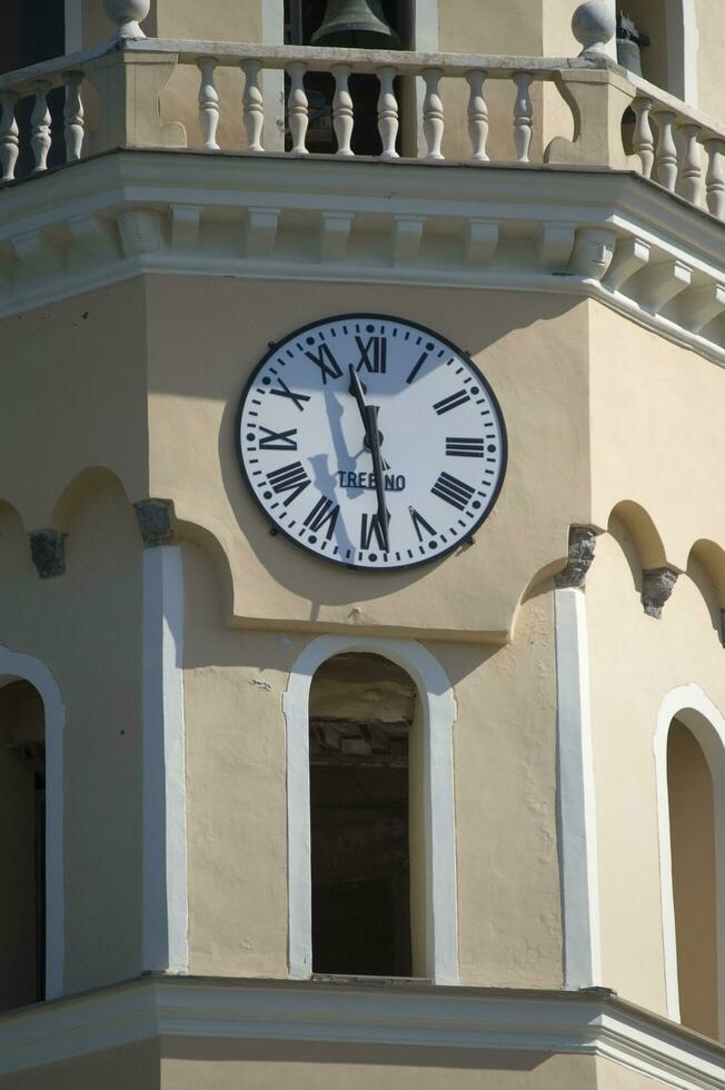 a clock on a building photo