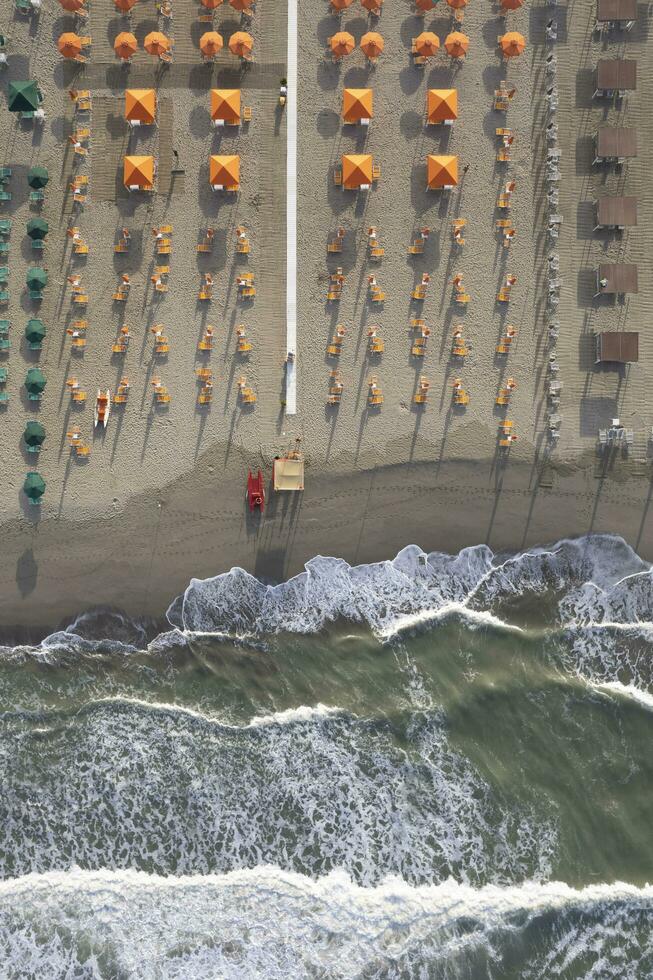 The equipped beach of Versilia seen from above photo