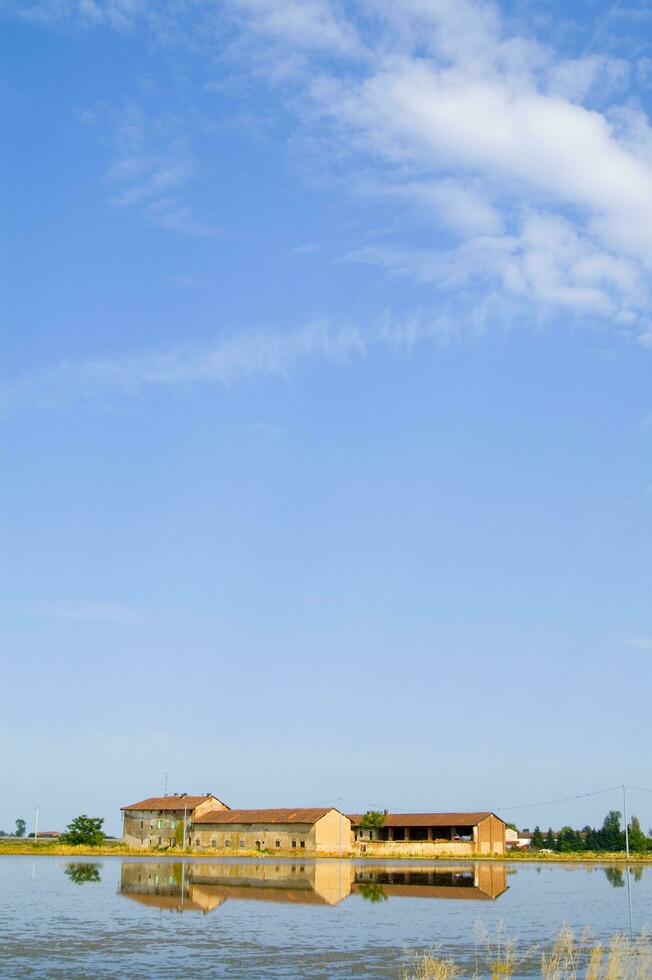 ancient farms in the rice fields in Vercelli Italy photo