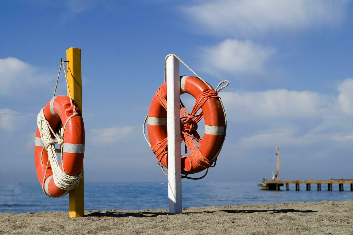 two life preservers on a beach photo