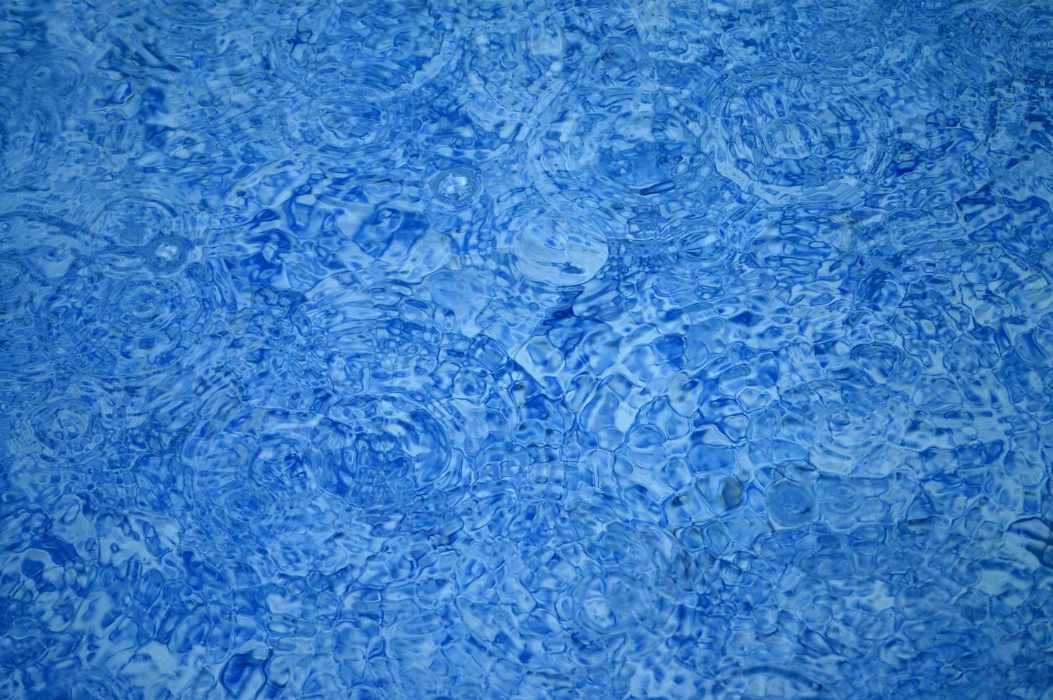 blue abstract background with water droplets photo