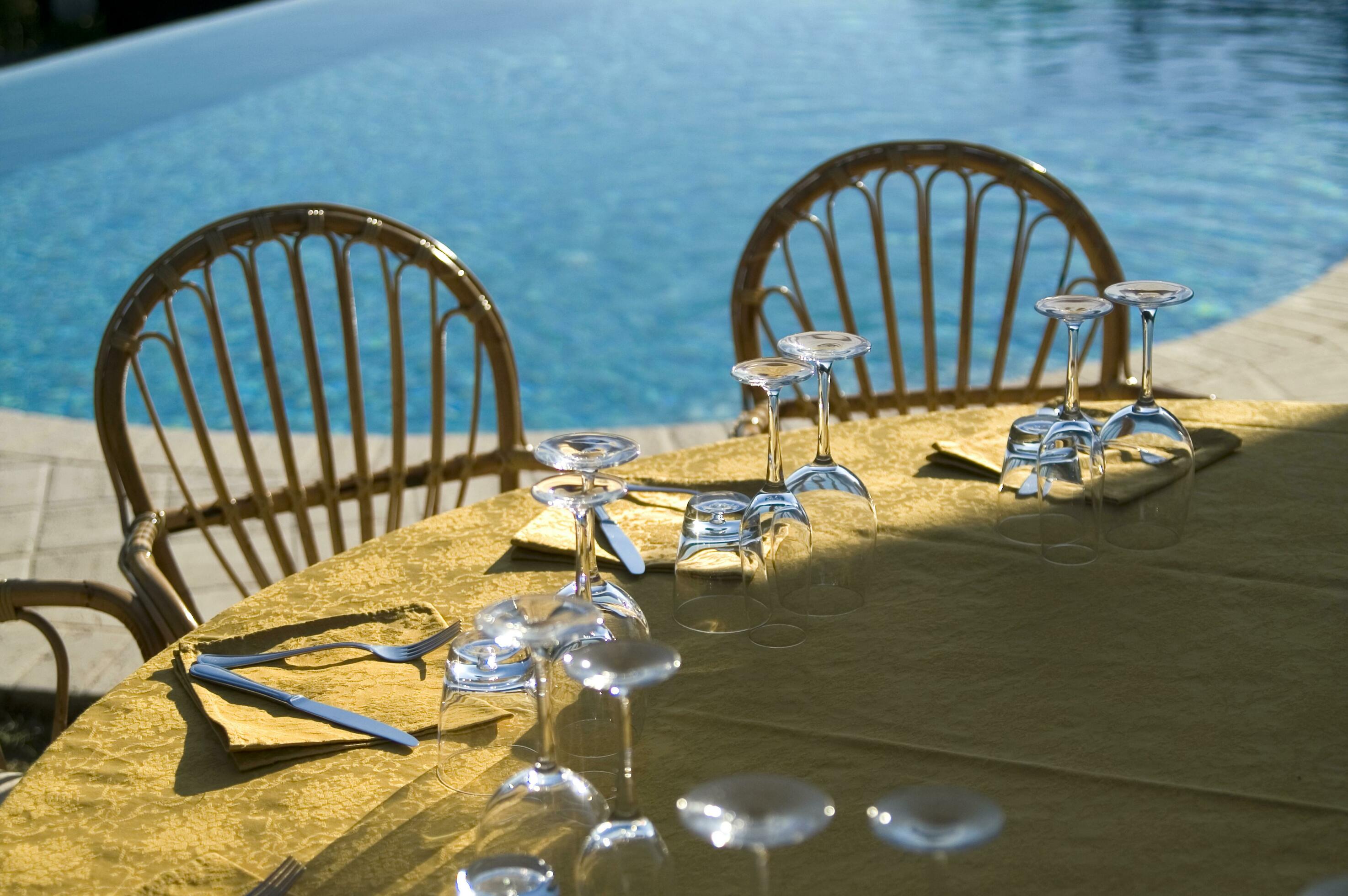 A Table Set For Dinner Near A Pool 27096034 Stock Photo At Vecteezy 23-must-try-recipes-that-are-cheap-and-filling