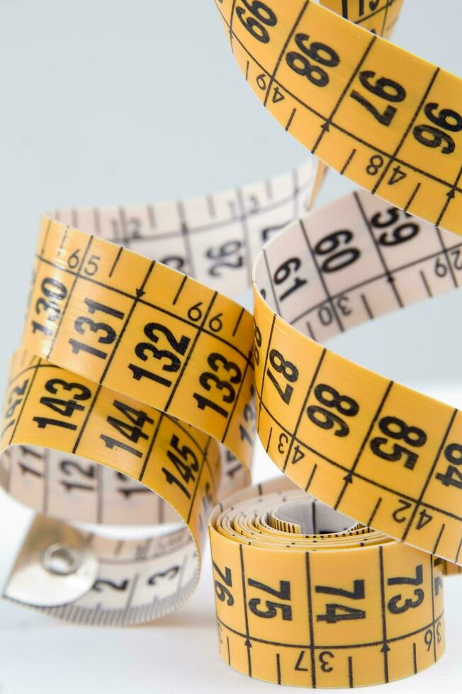 a close up of a measuring tape with numbers photo