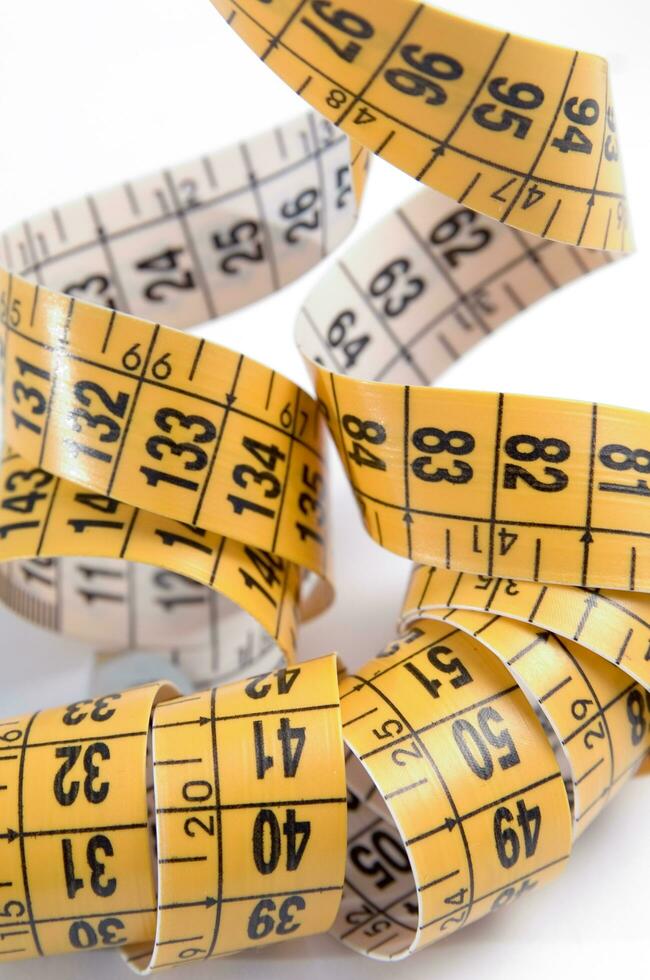 a close up of a measuring tape with numbers photo