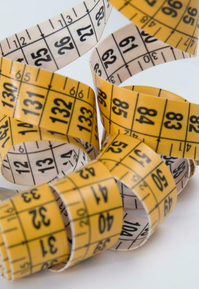 a close up of a measuring tape with numbers photo