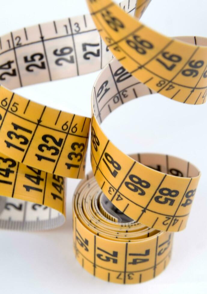 a close up of a measuring tape with numbers photo