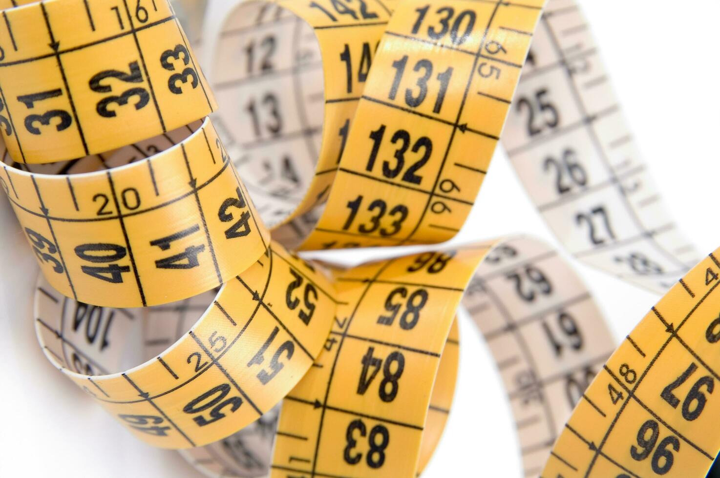 a close up of a measuring tape with numbers photo