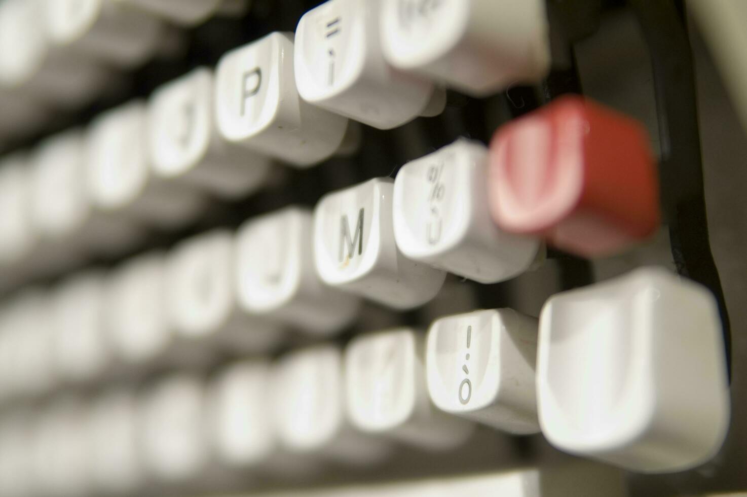 a close up of a typewriter keyboard with the letters oop photo