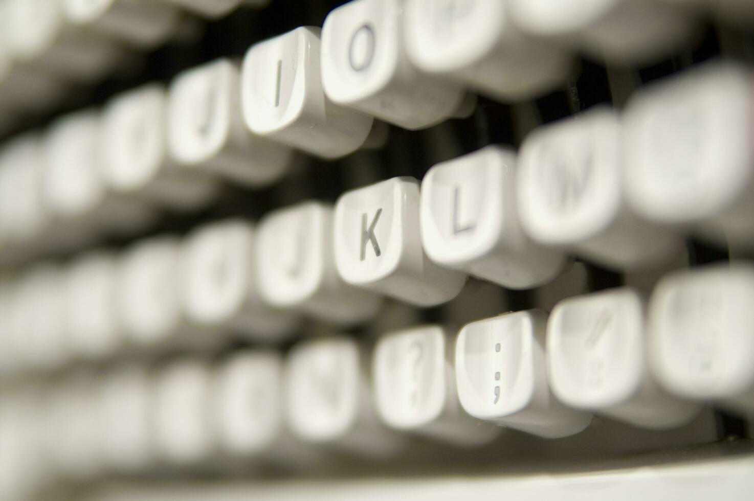 a close up of a typewriter keyboard with the letters oop photo
