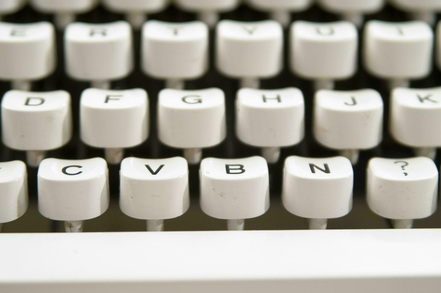 a close up of a typewriter keyboard with the letters oop photo