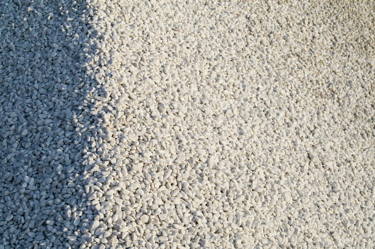 a close up of gravel on the ground photo