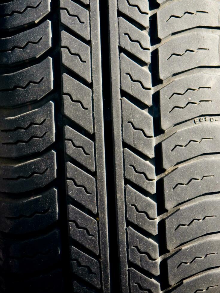 a close up of a tire on a truck photo