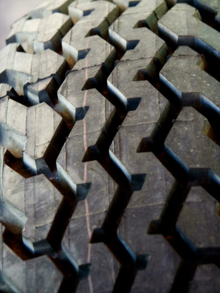 a close up of a tire on a truck photo