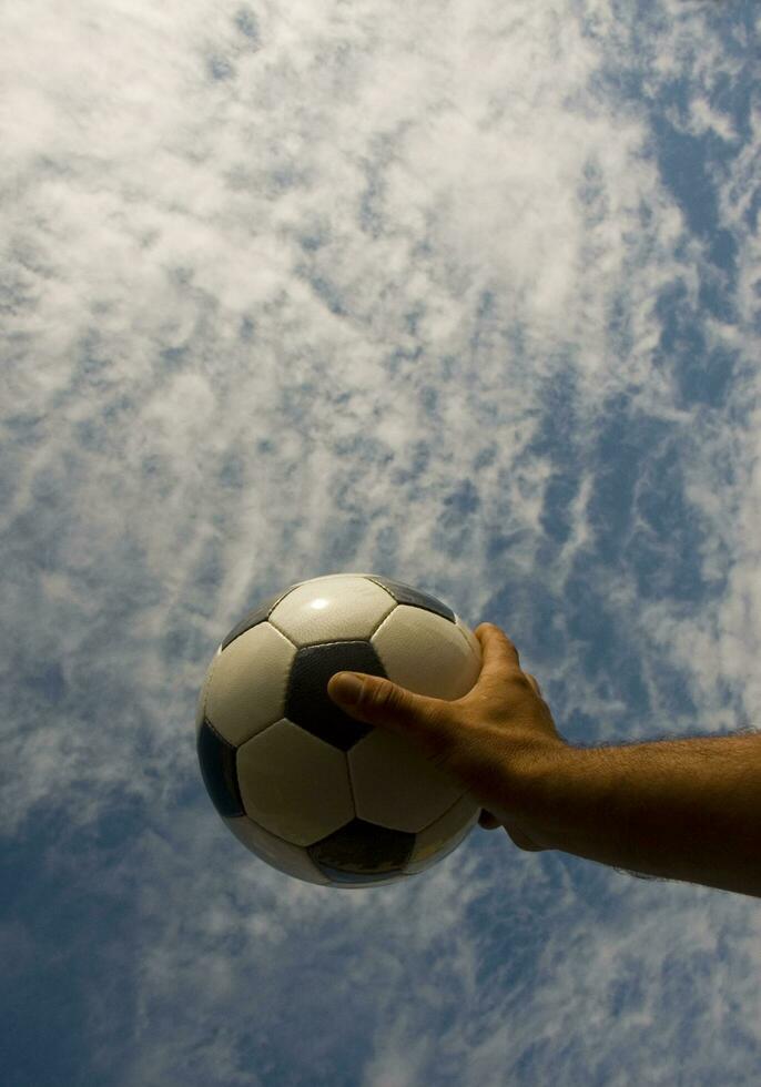 a close up of a soccer ball with leather photo