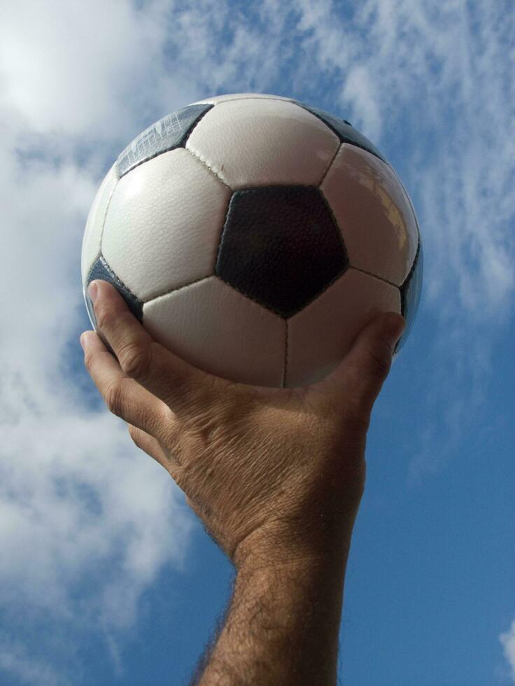 a close up of a soccer ball with leather photo