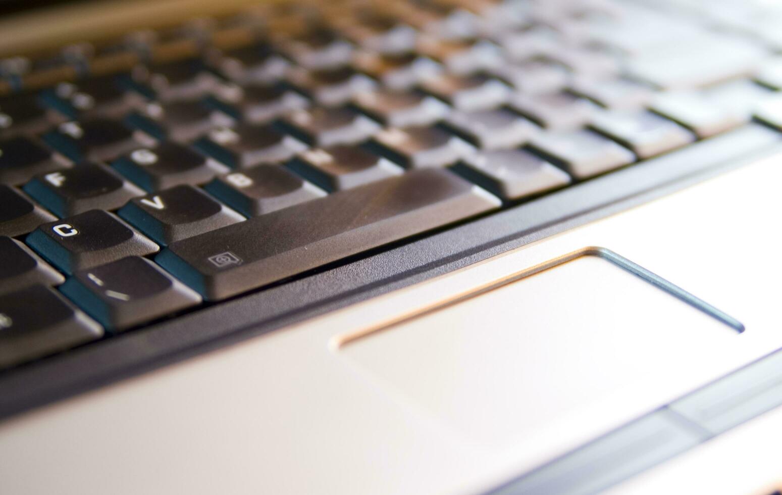 a close up of a keyboard on a laptop computer photo