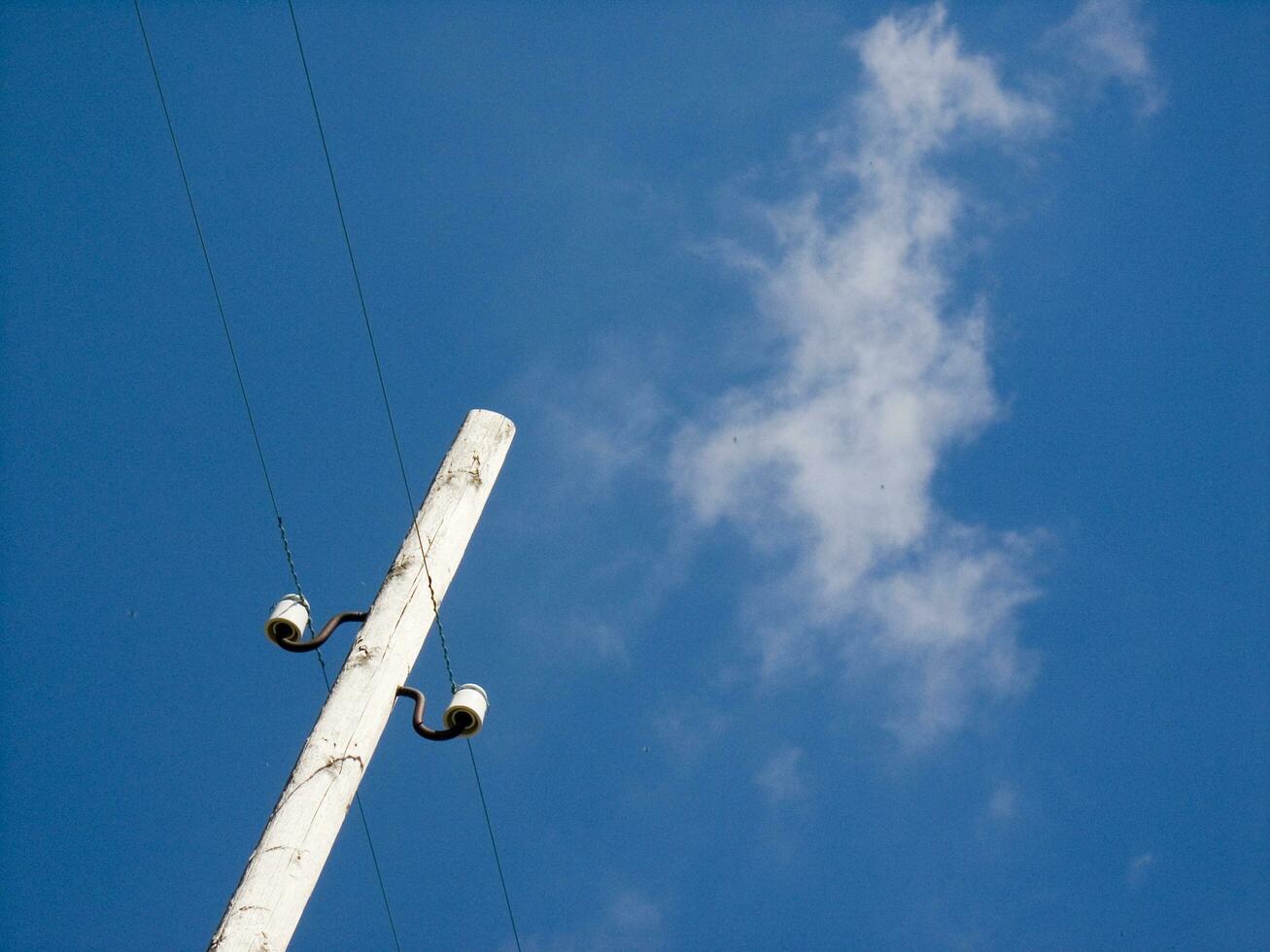 a telephone pole with two lights on it photo