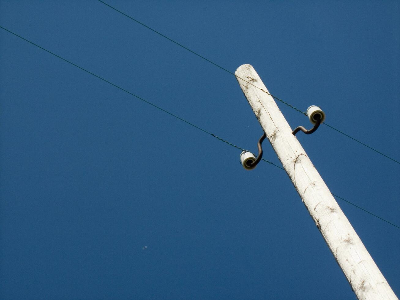 a telephone pole with two lights on it photo