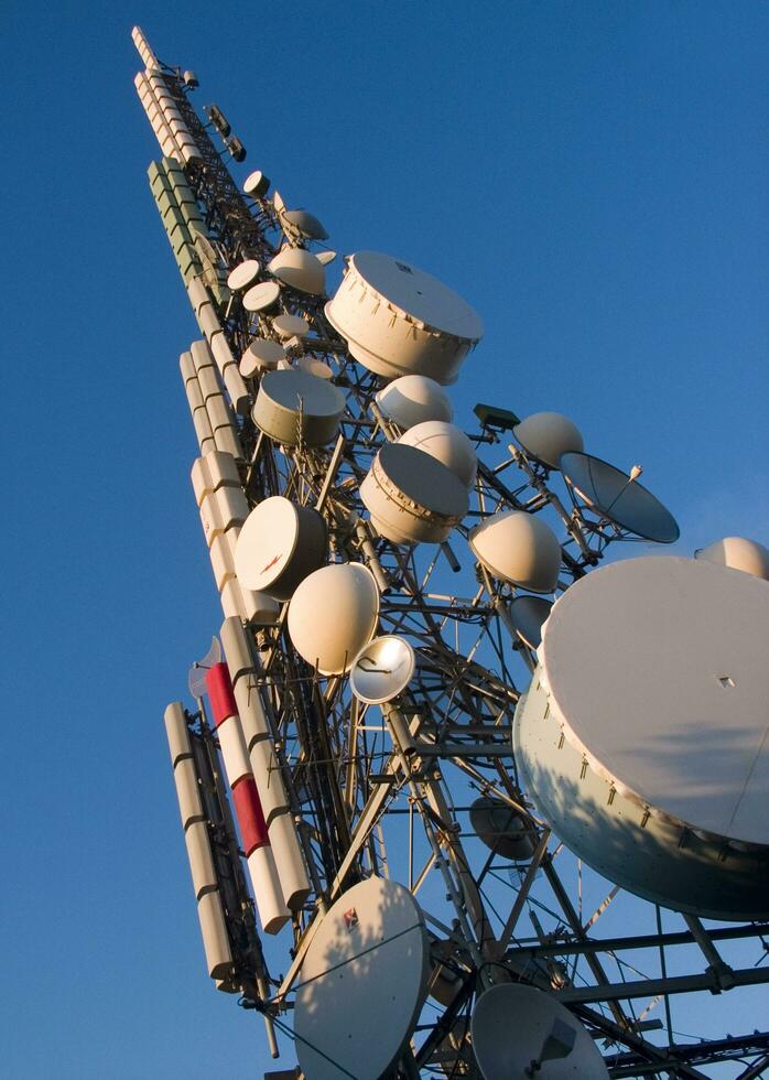 a tower with many different types of antennas photo