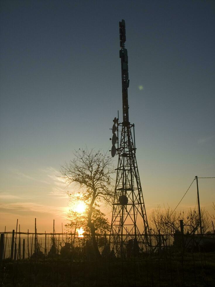 a tower with many different types of antennas photo