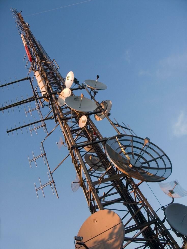 a tower with many different types of antennas photo