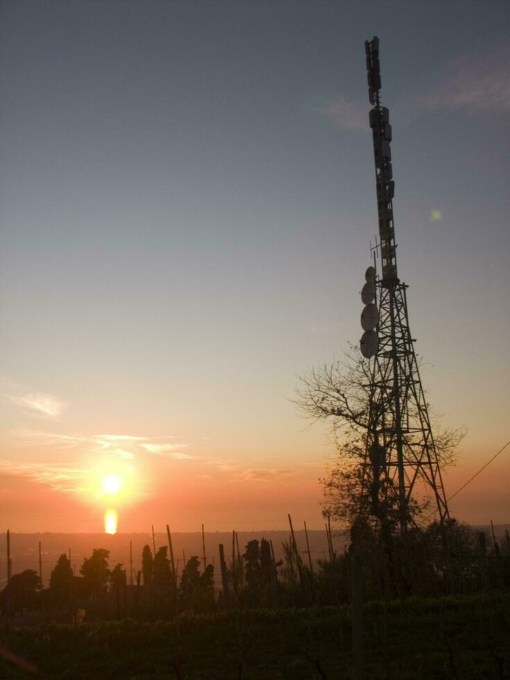 a tower with many different types of antennas photo
