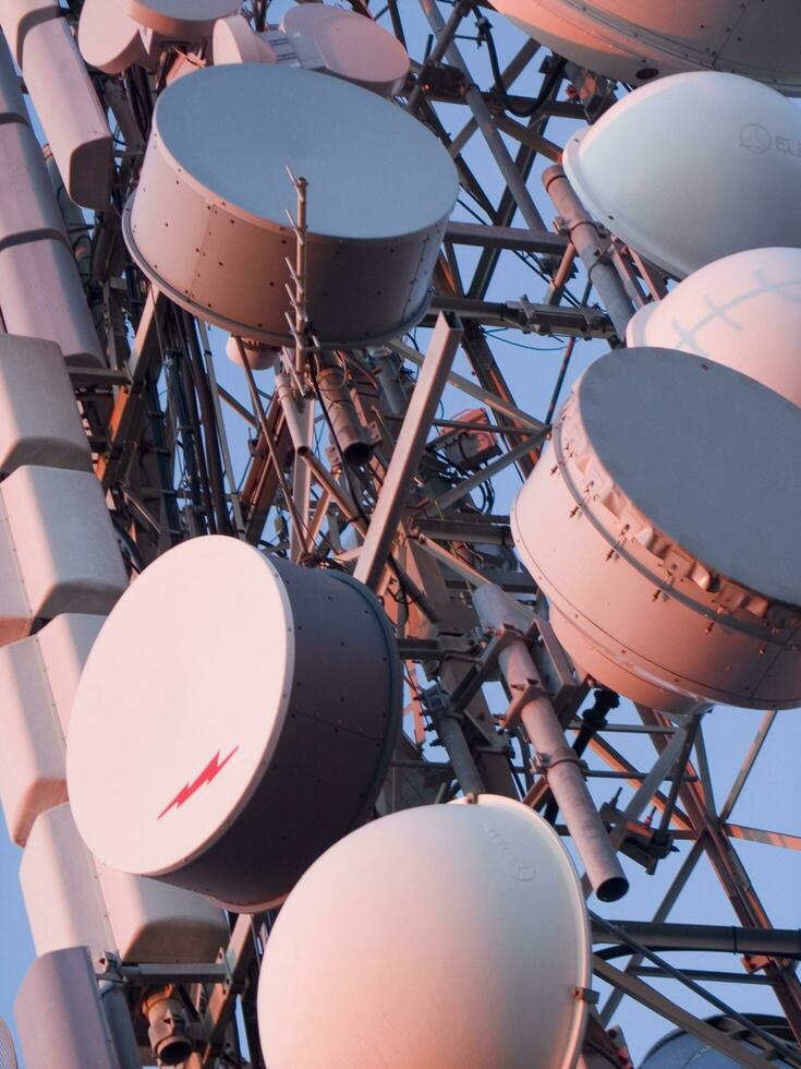 a tower with many different types of antennas photo