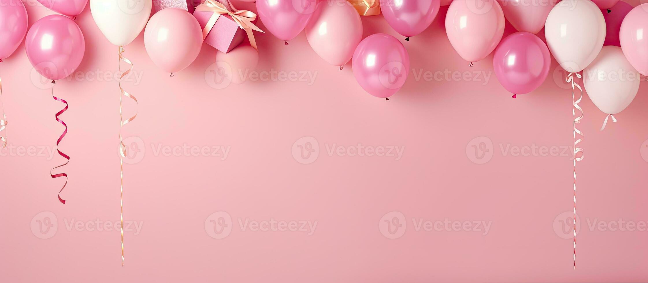 Festive birthday accessories with empty space in the center on a pink background photo