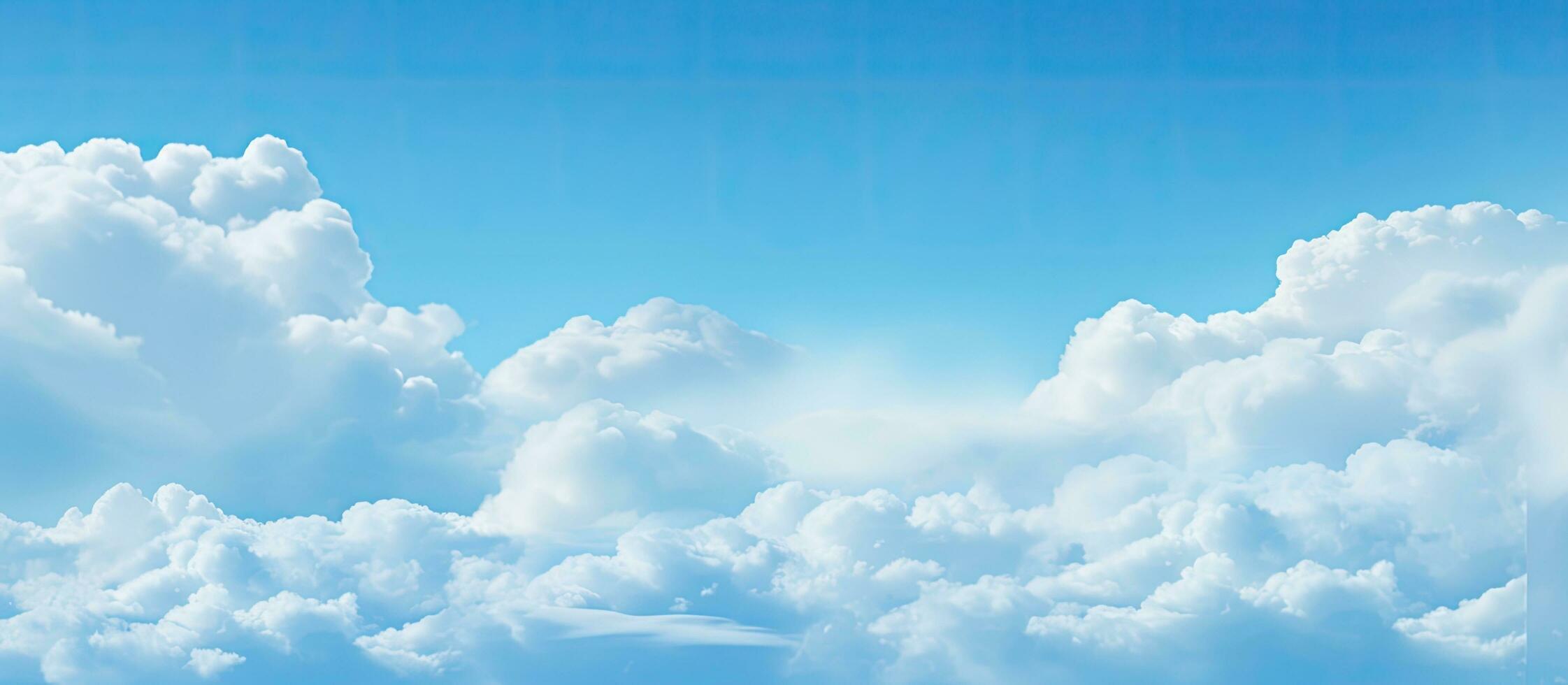 soft-focused image of a blue sky with white clouds. It is in a horizontal shape, and there is empty photo