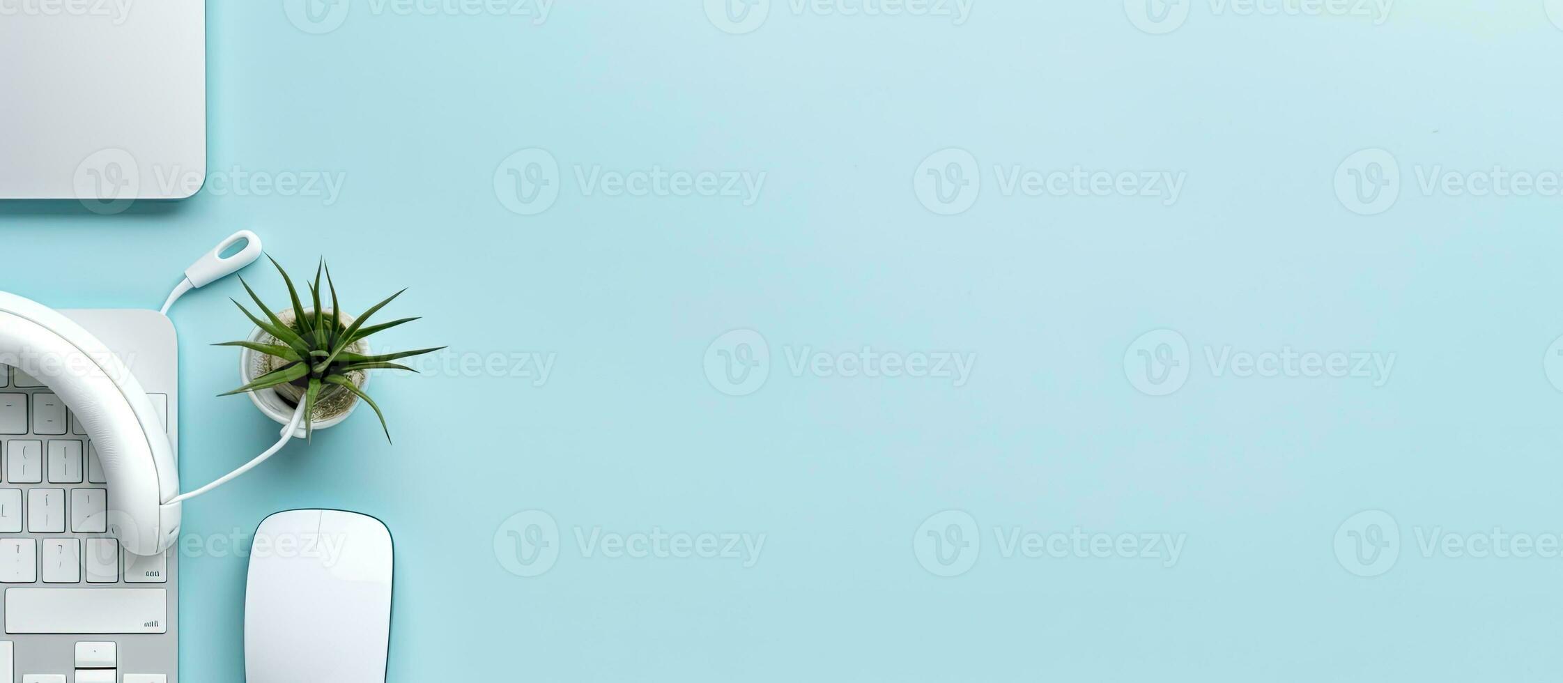 Modern devices available for your leisure at home include a white keyboard, mouse, and headphones photo